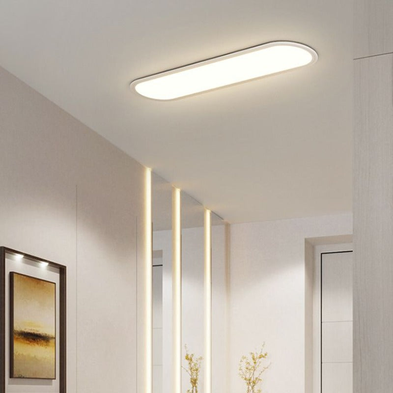 Slank oval plafond i sort eller hvid - Lumzi