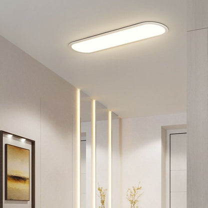 Slank oval plafond i sort eller hvid - Lumzi
