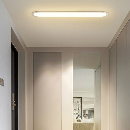 Slank oval plafond i sort eller hvid - Lumzi