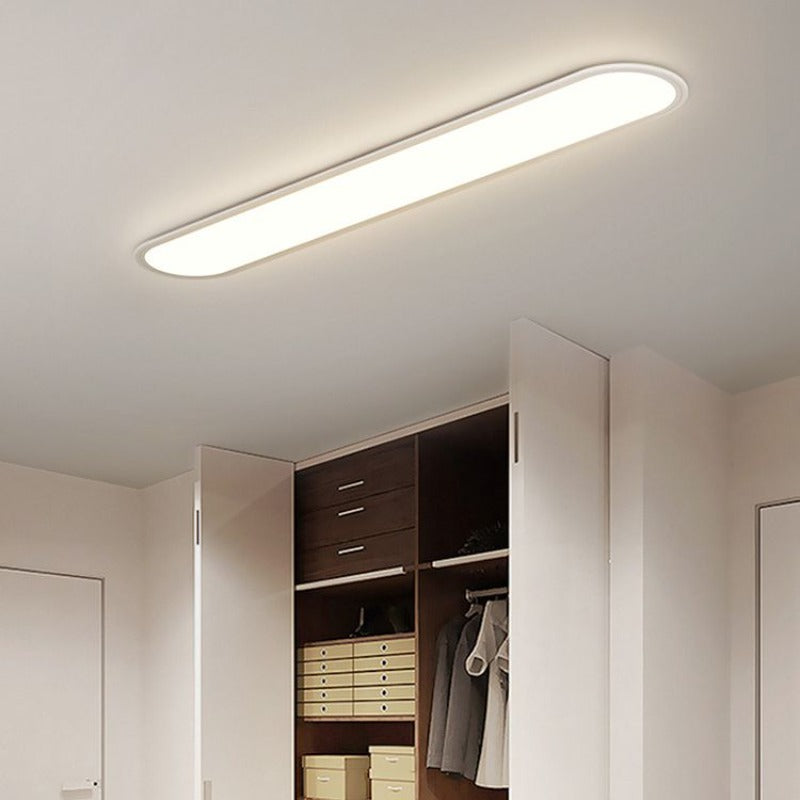 Slank oval plafond i sort eller hvid - Lumzi