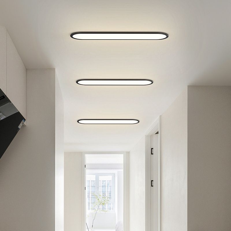 Slank oval plafond i sort eller hvid - Lumzi