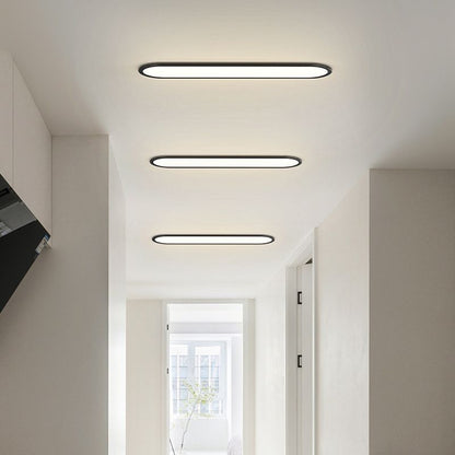 Slank oval plafond i sort eller hvid - Lumzi
