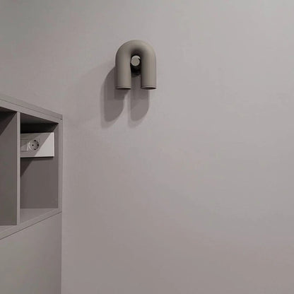 Bueformet LED-væglampe i moderne design