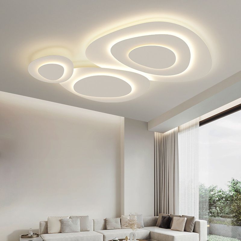 Plafond i hvid metal, skyformede paneler - Lumzi