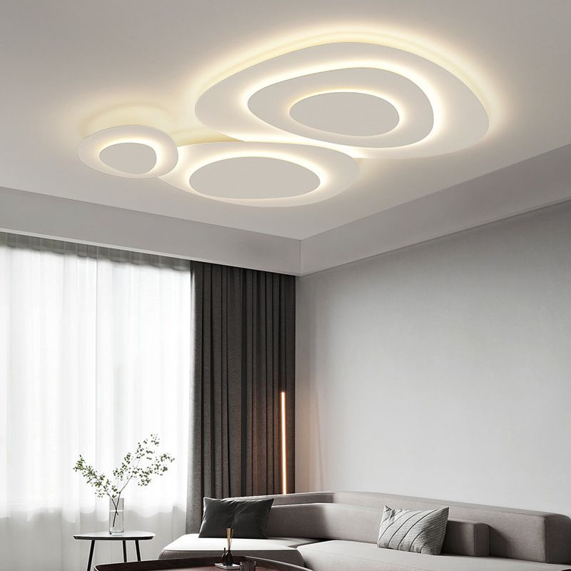 Plafond i hvid metal, skyformede paneler - Lumzi