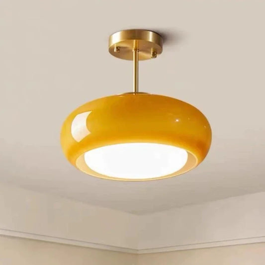 Elegant loftlampe med orange glasskærm i vintage stil