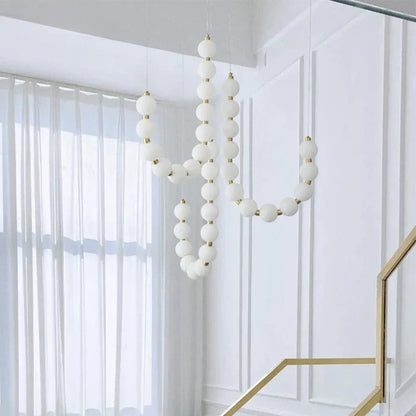 Moderne LED-pendellampe med lysende kuler – halskæde-design