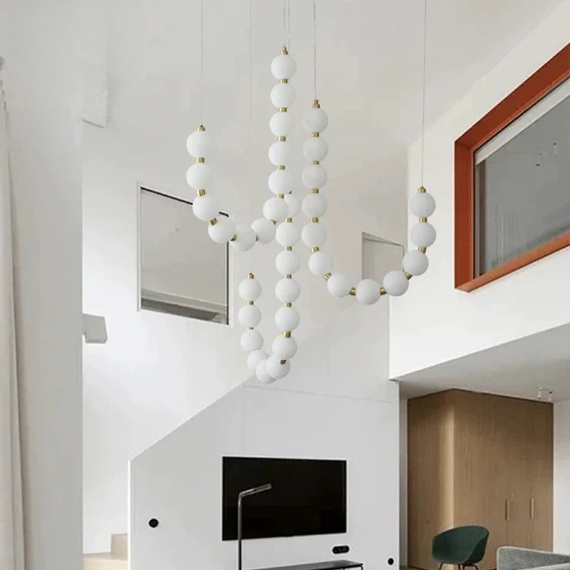 Moderne LED-pendellampe med lysende kuler – halskæde-design
