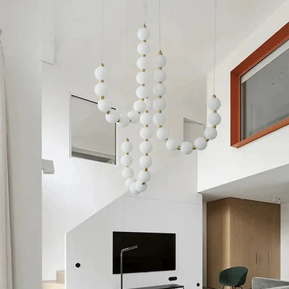 Moderne LED-pendellampe med lysende kuler – halskæde-design