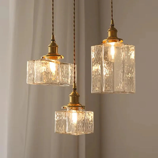 Vintage pendellampe i glas med messingfinish
