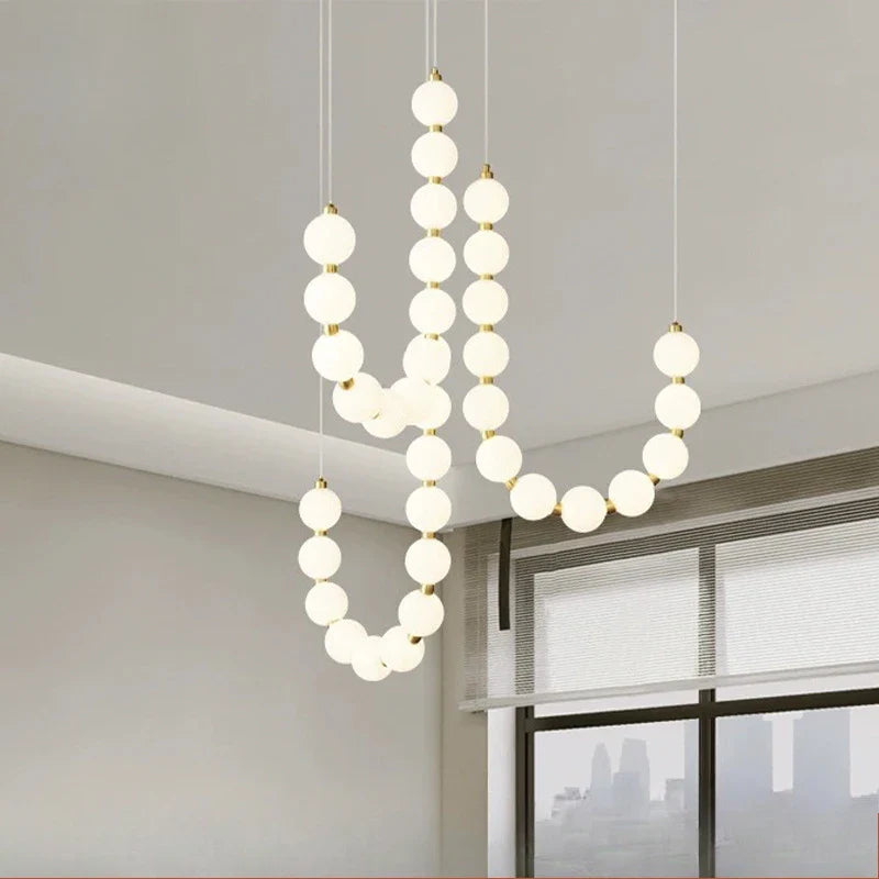 Moderne LED-pendellampe med lysende kuler – halskæde-design