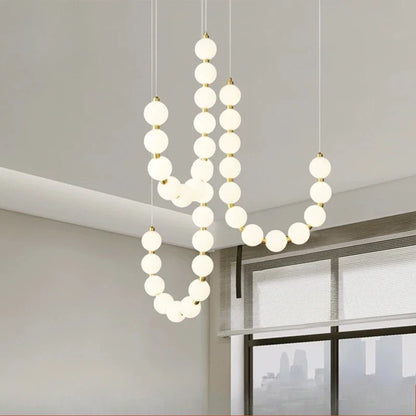 Moderne LED-pendellampe med lysende kuler – halskæde-design