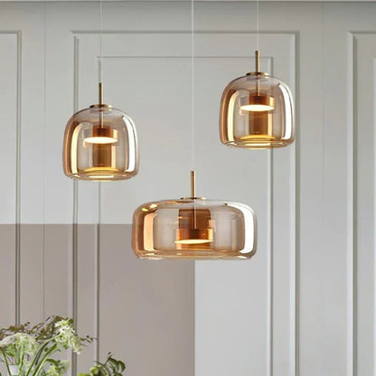 Moderne LED-pendellampe i glas med guldfinish