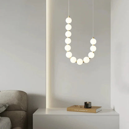 Moderne LED-pendellampe med lysende kuler – halskæde-design