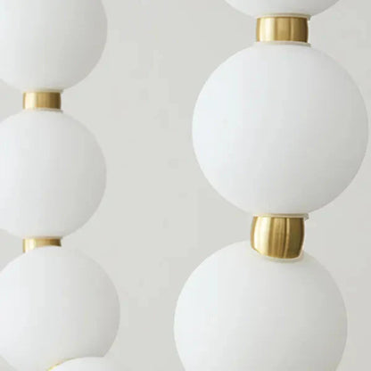 Moderne LED-pendellampe med lysende kuler – halskæde-design
