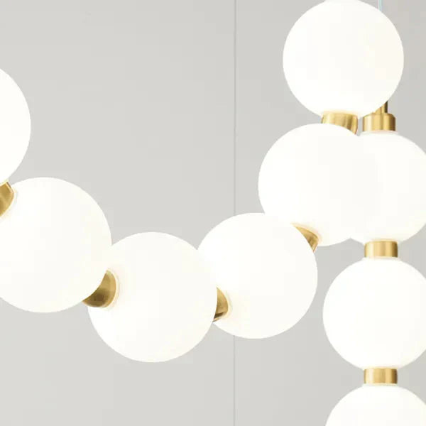 Moderne LED-pendellampe med lysende kuler – halskæde-design