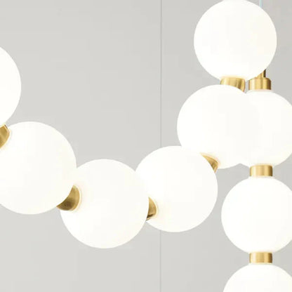 Moderne LED-pendellampe med lysende kuler – halskæde-design