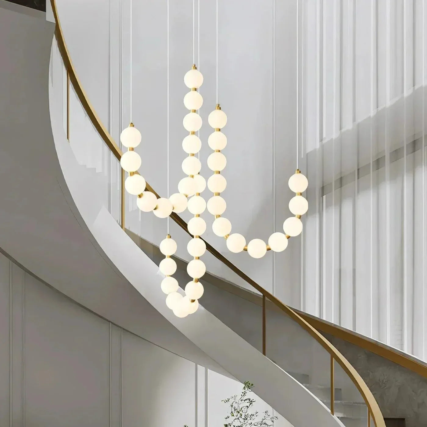 Moderne LED-pendellampe med lysende kuler – halskæde-design