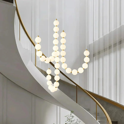 Moderne LED-pendellampe med lysende kuler – halskæde-design