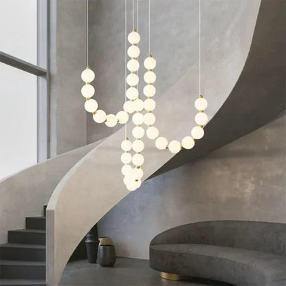 Moderne LED-pendellampe med lysende kuler – halskæde-design