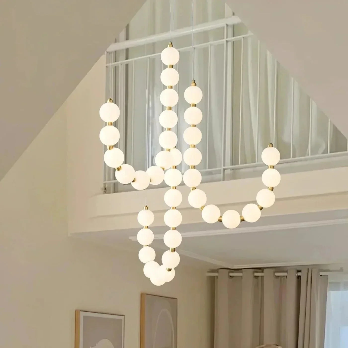 Moderne LED-pendellampe med lysende kuler – halskæde-design